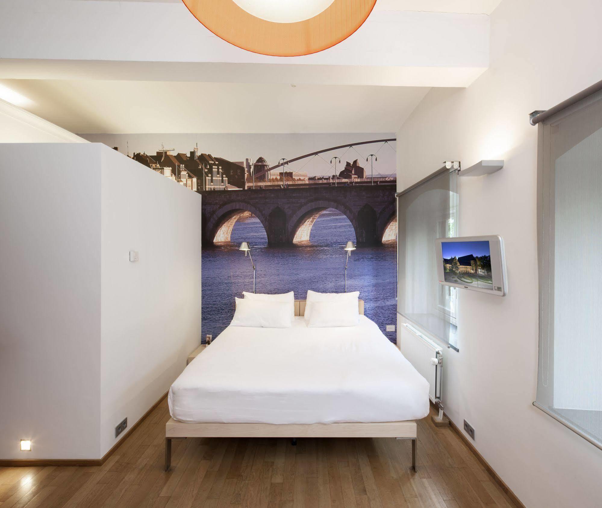 Kruisherenhotel Maastricht - Oostwegel Collection, Member Of Design Hotels Exterior foto A room at the hotel